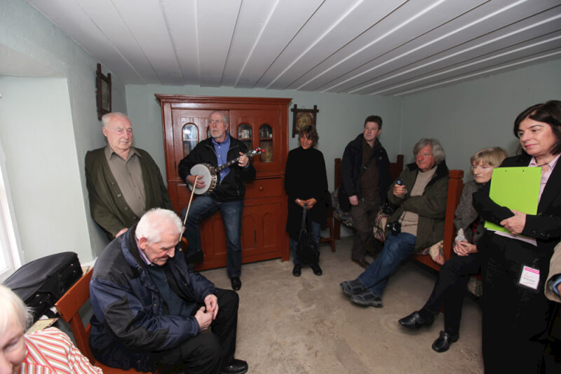 Denis McGowan singing at music session in SeÃ¡n MacDiarmada's house Kiltyclogher